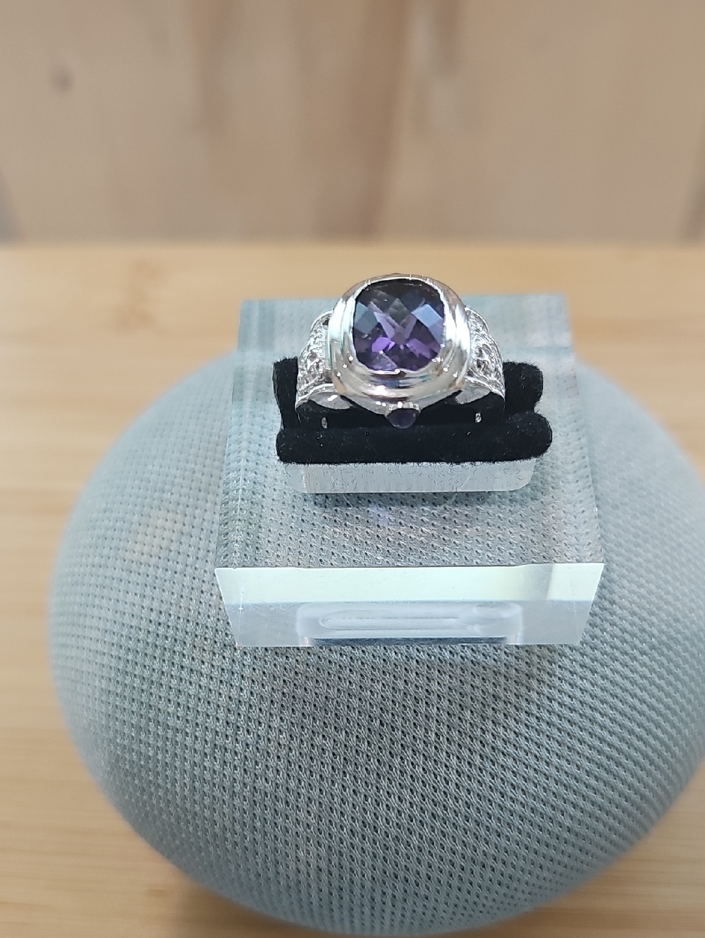 Sterling Silver Ring with Round Faceted Purple Gem
